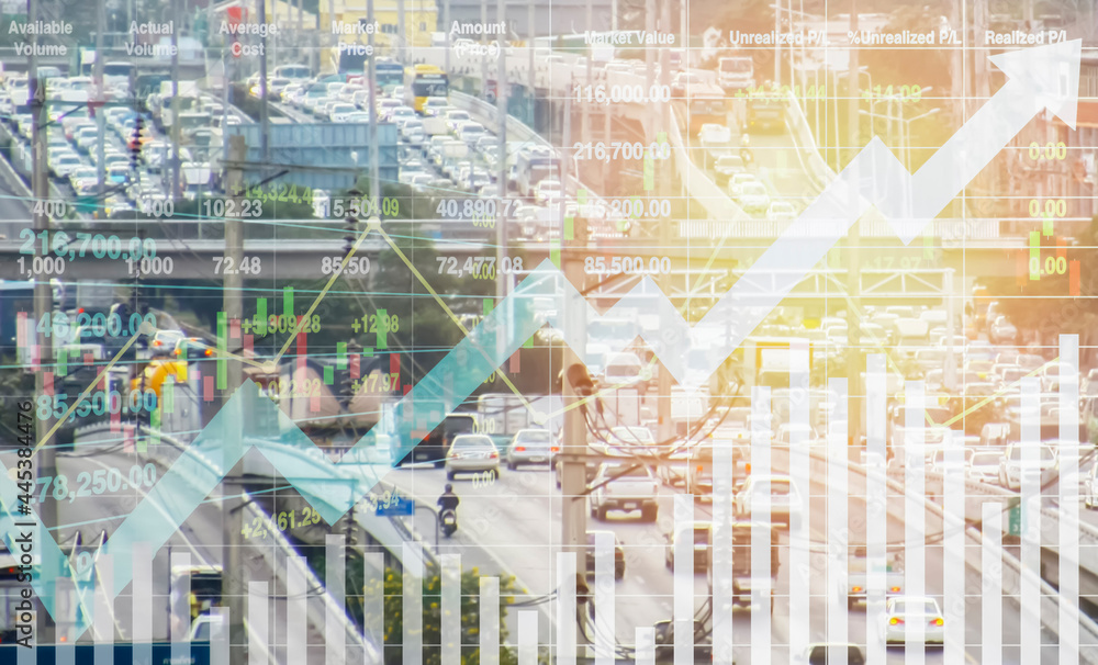 Fototapeta premium Stock financial index data with graph and chart show successful growth investment on transportation industry with blurry image of traffic density in the city for presentation and report background.