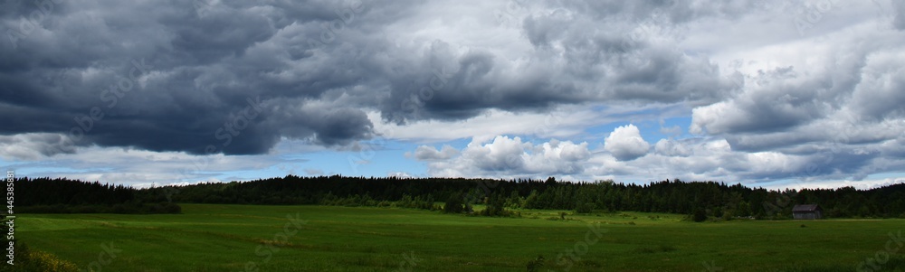 A field under a stormy sky, Québec, Canada A field under a stormy sky, Québec, Canada