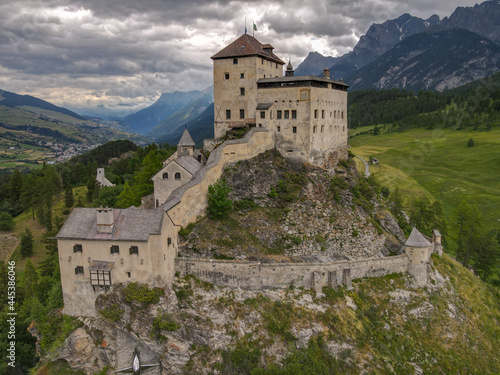 Drone view at Tarasp castle in the Swiss alps © fotoember