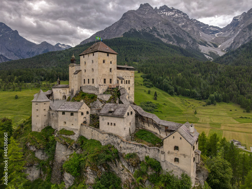 Drone view at Tarasp castle in the Swiss alps photo