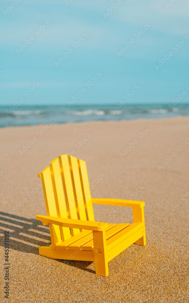 yellow chair on a lonely beach yellow chair on a lonely beach