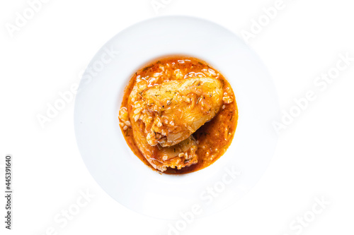 pepper stuffed rice vegetable tomato sauce fresh vegetables in plate on the table meal snack copy space food background rustic top view  © Alesia Berlezova