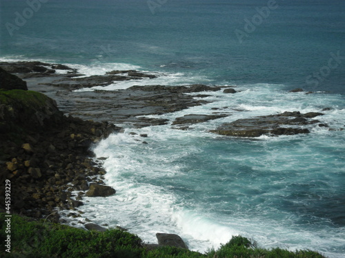 waves crashing on rocks © Dennis