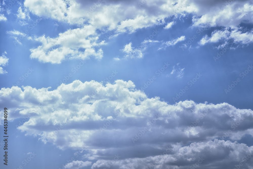 White clouds in a blue sky