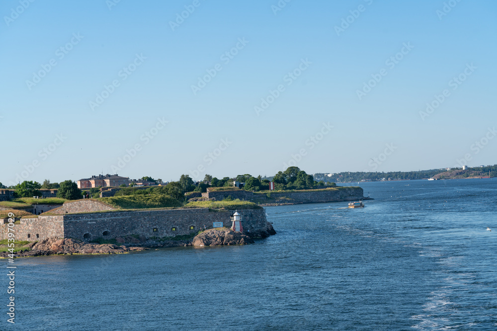 Suomenlinna castle from the Baltic sea side. View from the ship sailing towards Helsinki