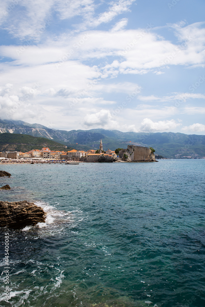 Montenegro, Budva, very beautiful view of the old town and citadel in Budva. Beautiful clouds on a warm day.