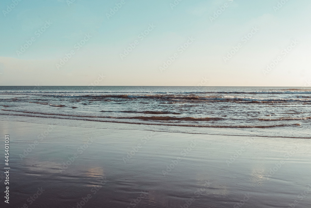 calm wave, blue ocean and blue sky daylight, tropical beach