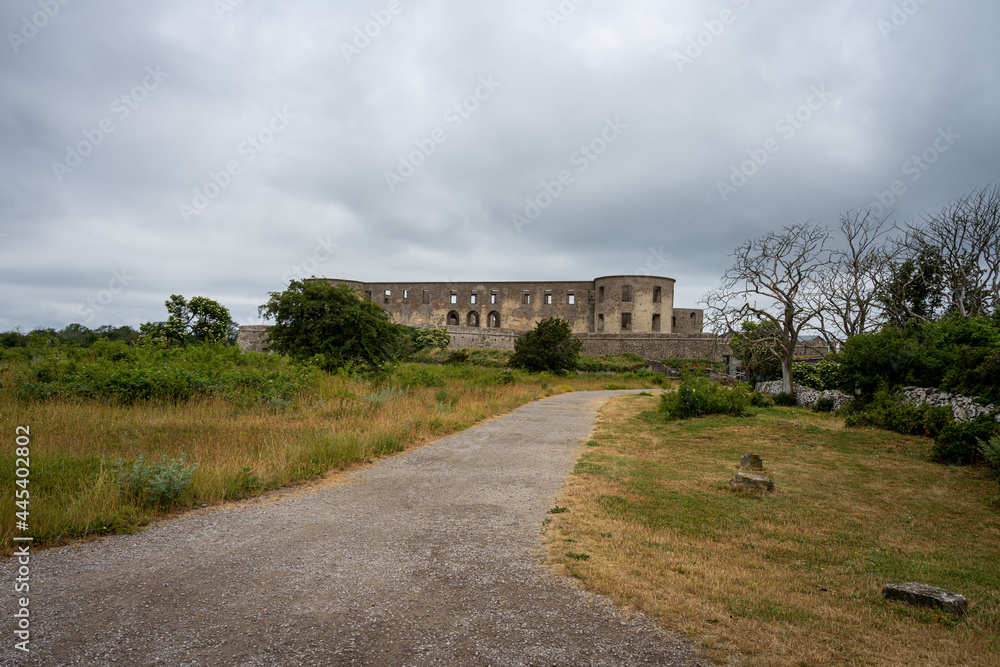 An old castle with a dramatic sky in the background. Borgholm castle ruins on the Baltic Sea island Oland