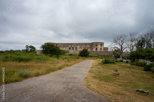 An old castle with a dramatic sky in the background. Borgholm castle ruins on the Baltic Sea island Oland © Dan