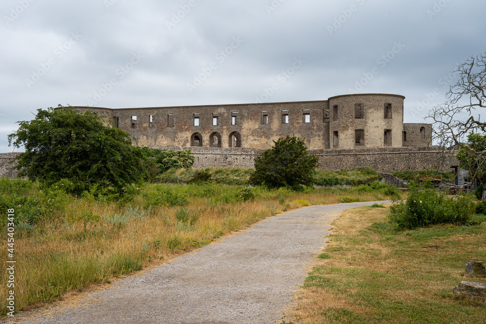 An old castle with a dramatic sky in the background. Borgholm castle ruins on the Baltic Sea island Oland