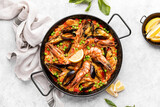 Paella in a special pan, ready to eat, view from above