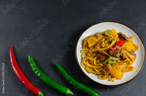 Lagman or pasta with meat and vegetables