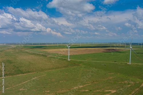 Panoramic view wind farm with blades turbine in a field in West Texas