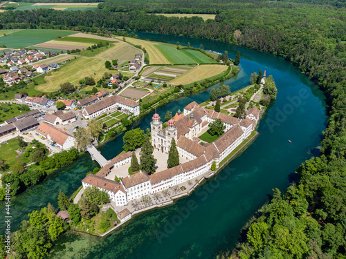 Switzerland, Canton of Zurich, Rheinau, Aerial view of�Rheinau Abbey and surrounding forest in summer photo