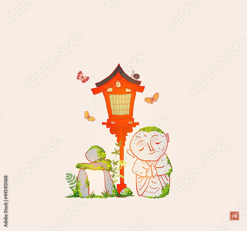 Japanese zen garden composition. Red toro lantern, mossy zen rock sculpture and Jizo boddhisattva statiue. Translation of hieroglyph - zen