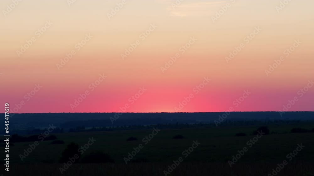 Large orange sunset as massive summer into horizon. Natural colors. Large orange sunset as massive summer into horizon. Natural colors.
