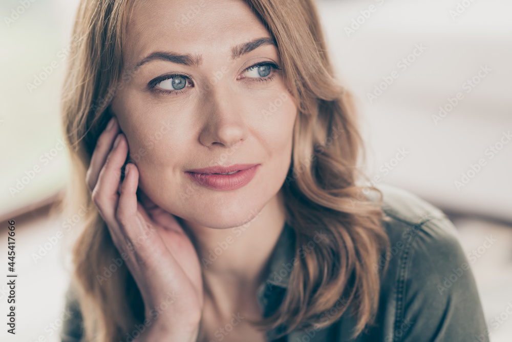 Cropped view portrait of attractive peaceful dreamy wavy-haired woman fantasizing touching face spending time staying at home house flat indoors Cropped view portrait of attractive peaceful dreamy wavy-haired woman fantasizing touching face spending time staying at home house flat indoors