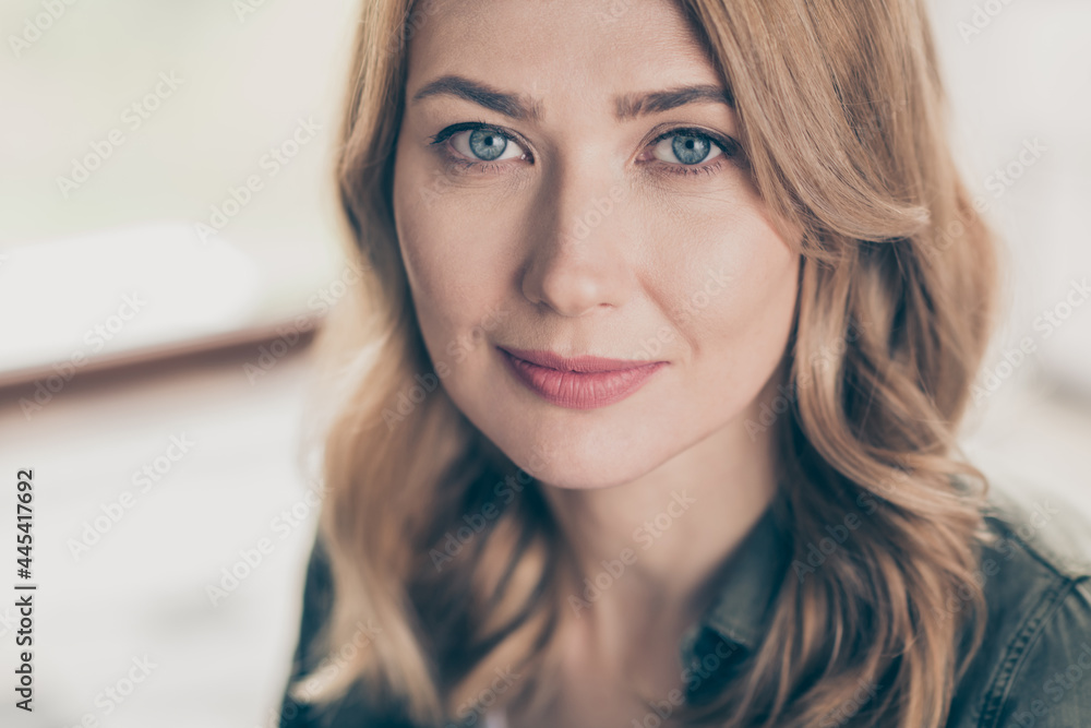 Cropped view portrait of attractive cheery wavy-haired woman spending free time staying at home house flat indoors Cropped view portrait of attractive cheery wavy-haired woman spending free time staying at home house flat indoors