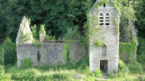The creepy derelict shell of St. Mary's Church in Tintern, Wales photo