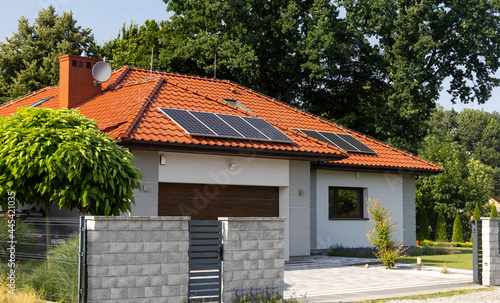 solar panels on roof of house, renewable energy