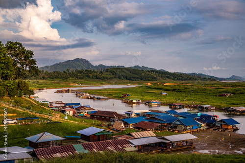 Mon Bridge, old wooden bridge at sunset in Sangkhlaburi, Kanchanaburi, Thailand photo