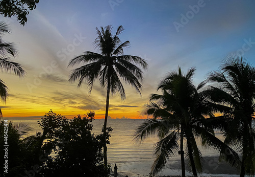 Silhouette at the hun hin beach of thailand on early morning in summer, Beautiful sunset over the sea.