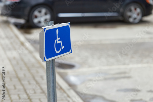 blue parking sign for invalid. Place for disabled cars.