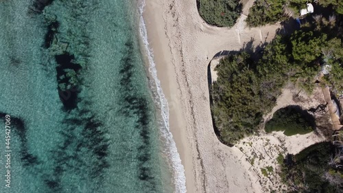 Aerial View by Drone of the Coast in Marina di Pulsano, near Taranto, South of Italy, in a Sunny Day of Waves that Break on the Sand
