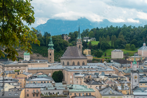 Austria, Salzburg State, Salzburg, Historic old town with Saint Peters Abbey and Offener Himmel Infopoint Kirchen in background photo