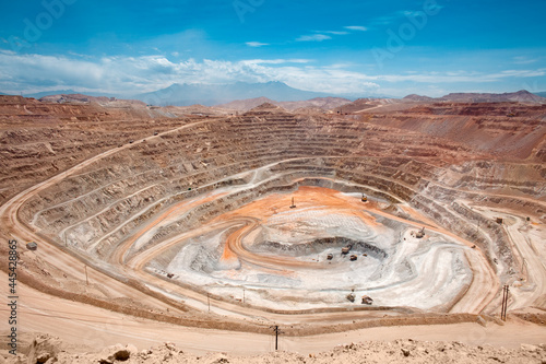 View from above of the pit of an open-pit copper mine in Peru photo