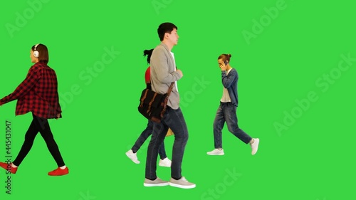 Flow of young people outdoors, multiethnic on a Green Screen, Chroma Key.