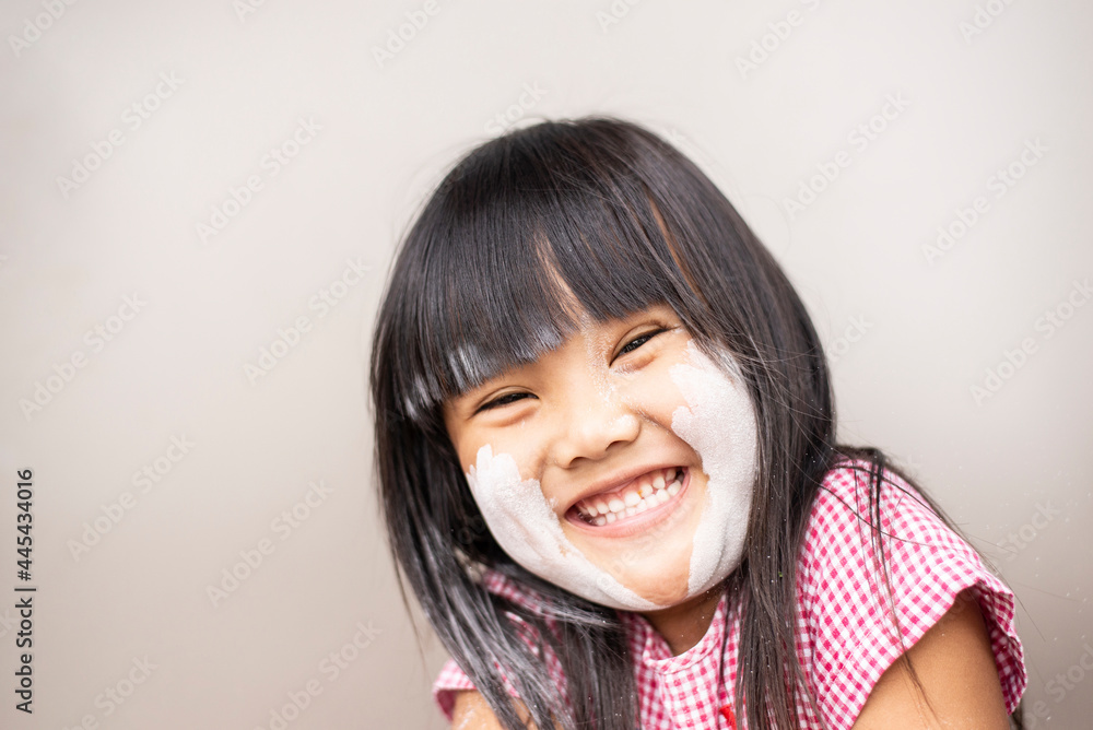 The happy face had a happy smile of a girl. The happy face had a happy smile of a girl.