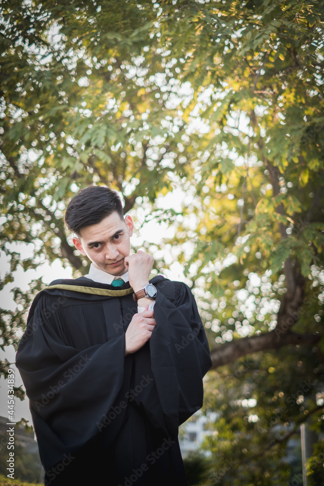 A man acting cerebrate for Graduate Faculty of Pharmacy in University of Thailand. A man acting cerebrate for Graduate Faculty of Pharmacy in University of Thailand.