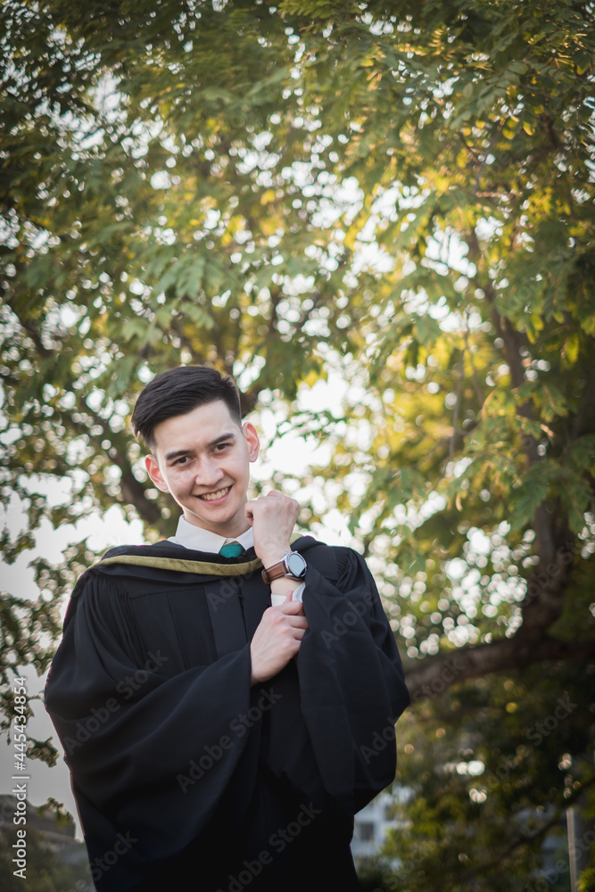 A man acting cerebrate for Graduate Faculty of Pharmacy in University of Thailand. A man acting cerebrate for Graduate Faculty of Pharmacy in University of Thailand.