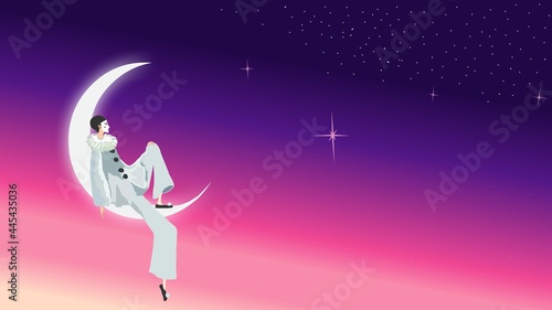 Pierrot sits on the moon against the starry night sky photo