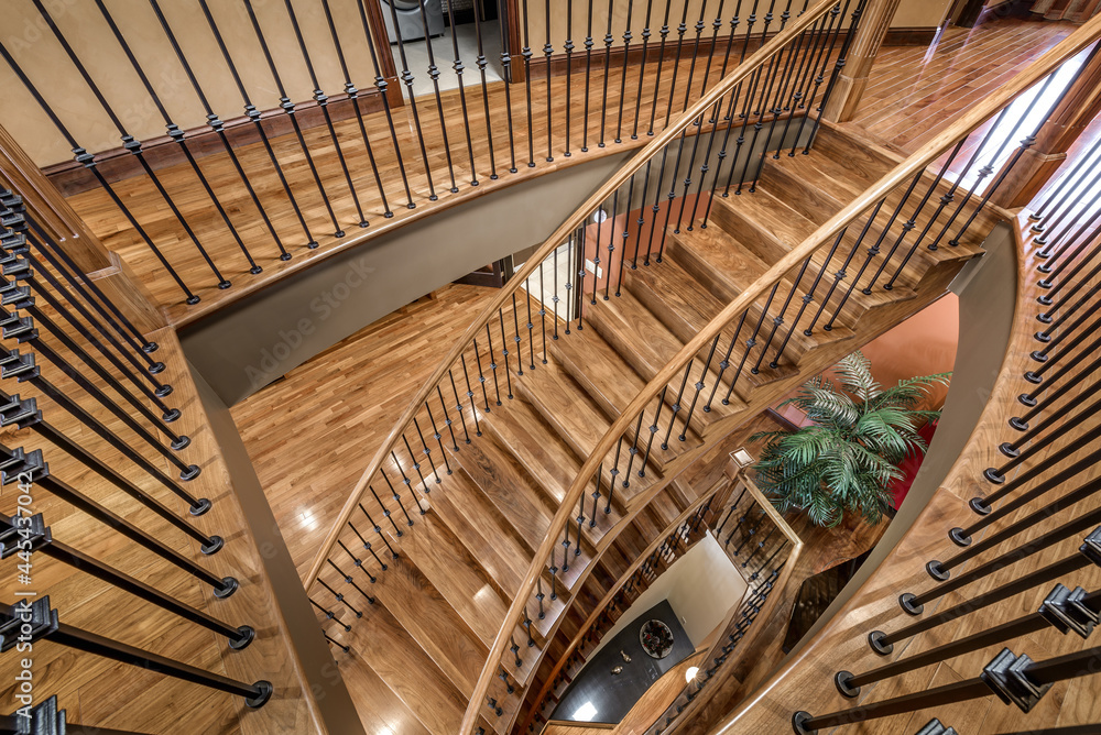 Obraz premium Luxury Canadian House with wood working, wood floors, wood staircases, furnished, staged and well kept