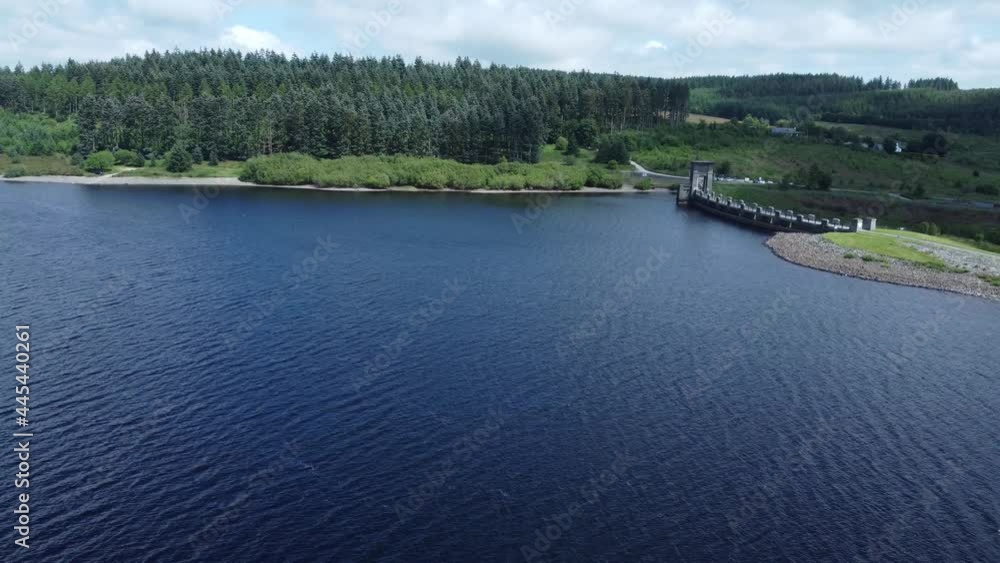 Alwen reservoir Welsh woodland lake water supply aerial view concrete dam countryside park wide descend to lagoon Alwen reservoir Welsh woodland lake water supply aerial view concrete dam countryside park wide descend to lagoon