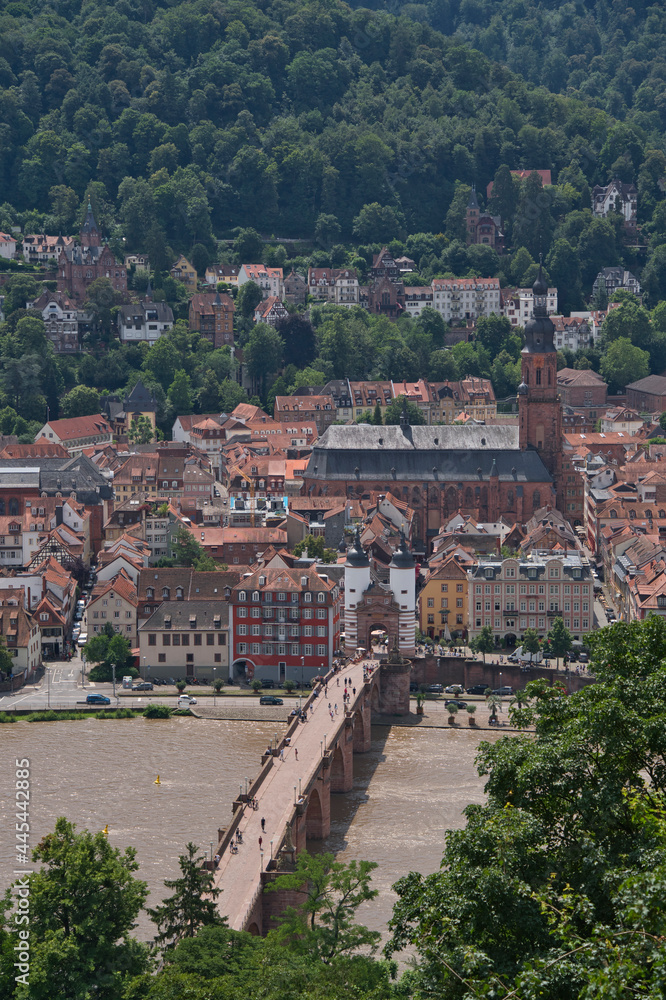 Old bridge of Heidelberg crossing the Neckar river, with Heiliggeistkirche, Baden-Wuerttemberg, Germany