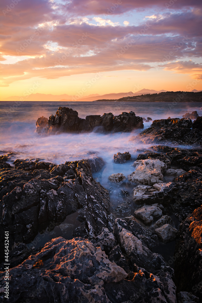 Obraz premium Sunset seascape of picturesque rocks on the coast of Albania