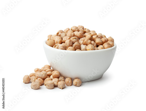 Raw chickpea beans in bowl isolated on white background. Uncooked chickpeas. Healthy eating