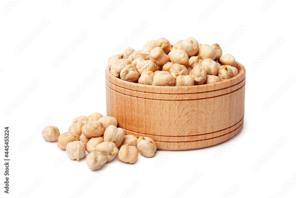Raw chickpea beans in wooden bowl isolated on white background. Uncooked chickpeas. Healthy eating Raw chickpea beans in wooden bowl isolated on white background. Uncooked chickpeas. Healthy eating
