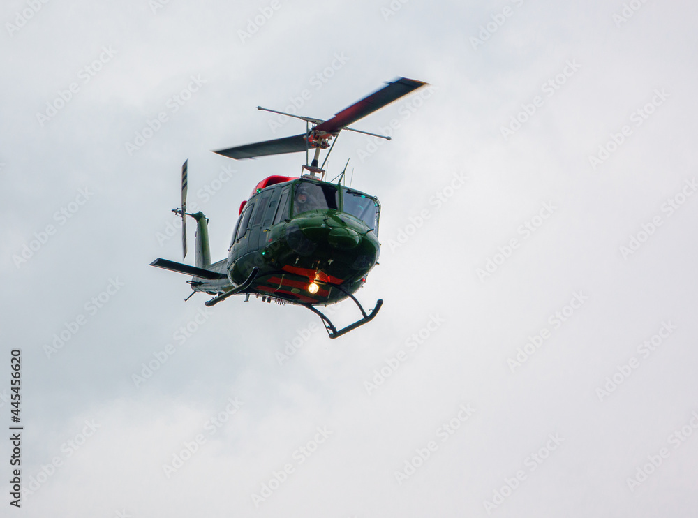 British Army Air Corps ZJ969 Bell 212 pilot training helicopter flying over Saisbury Plain (SPTA) UK British Army Air Corps ZJ969 Bell 212 pilot training helicopter flying over Saisbury Plain (SPTA) UK