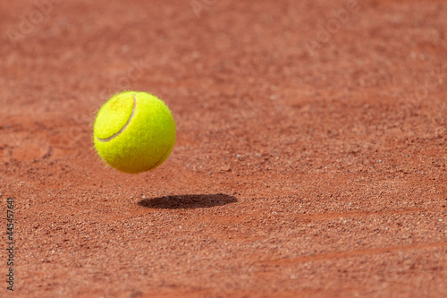 Tennis ball on a tennis clay court. Professional sport concept © Augustas Cetkauskas
