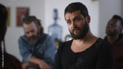 Photos Drug addict talking during group meeting