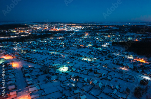 Aerial View Of Town Skyline Winter Night. Snowy Landscape Cityscape Skyline photo