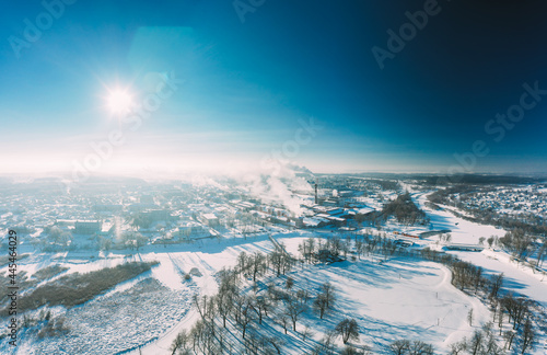 Dobrush  Gomel Region  Belarus. Aerial View Of Skyline Cityscape In Sunny Winter Day. Snowy Landscape Cityscape Skyline with Shining Sun