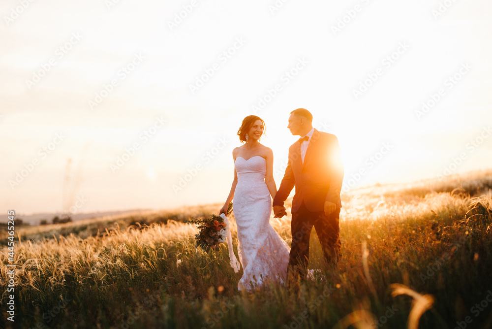 A couple in love a guy and a girl on a walk in the forest belt