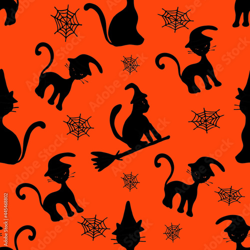 Hand drawn seamless pattern with Halloween black cats on orange background. Doodle style. Suitable for wrapping paper, textiles, notebook covers, clithes, bags, scrapbooking and wallpaper photo