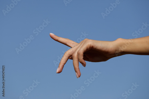 hand on the sky background