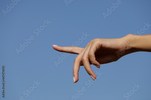 hand in the sky. Finger. Hand woman. Sensual. Photo. 
